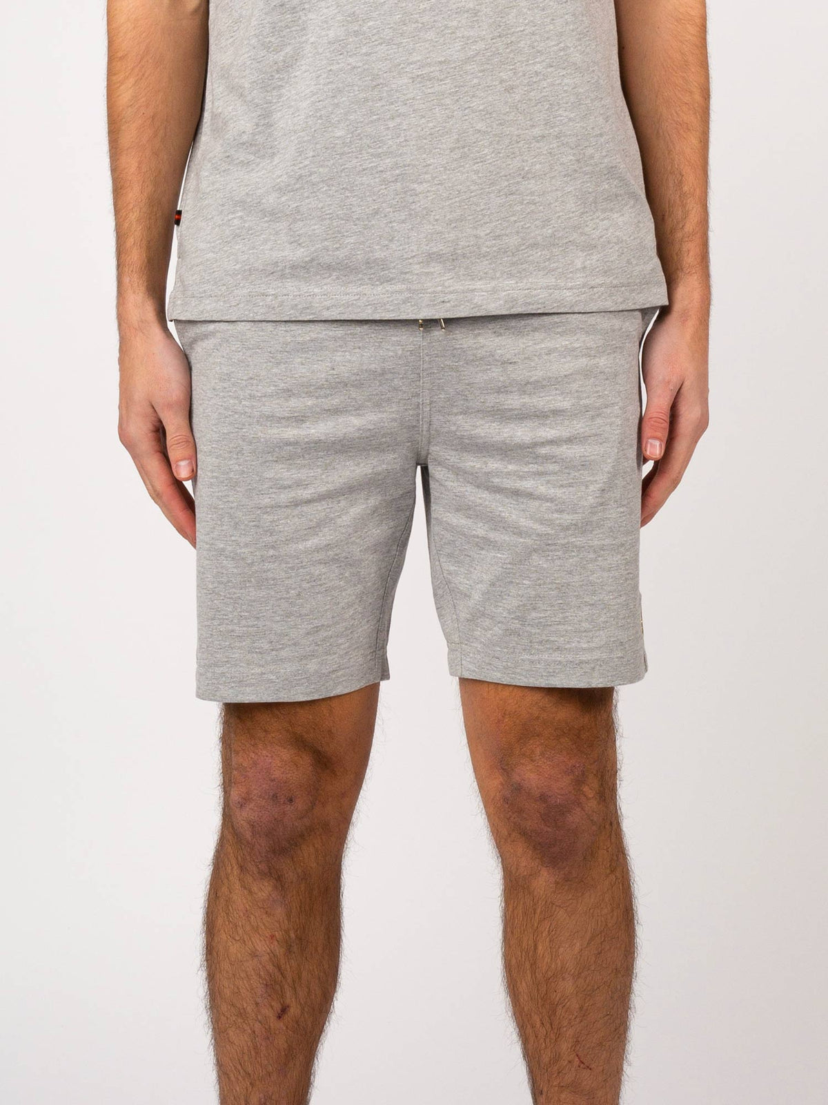 Men's grey shorts with drawstring waistband.