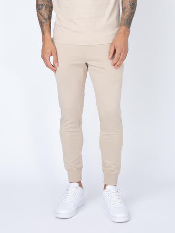 Men's beige joggers.