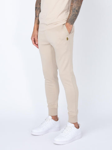 Men's beige joggers.