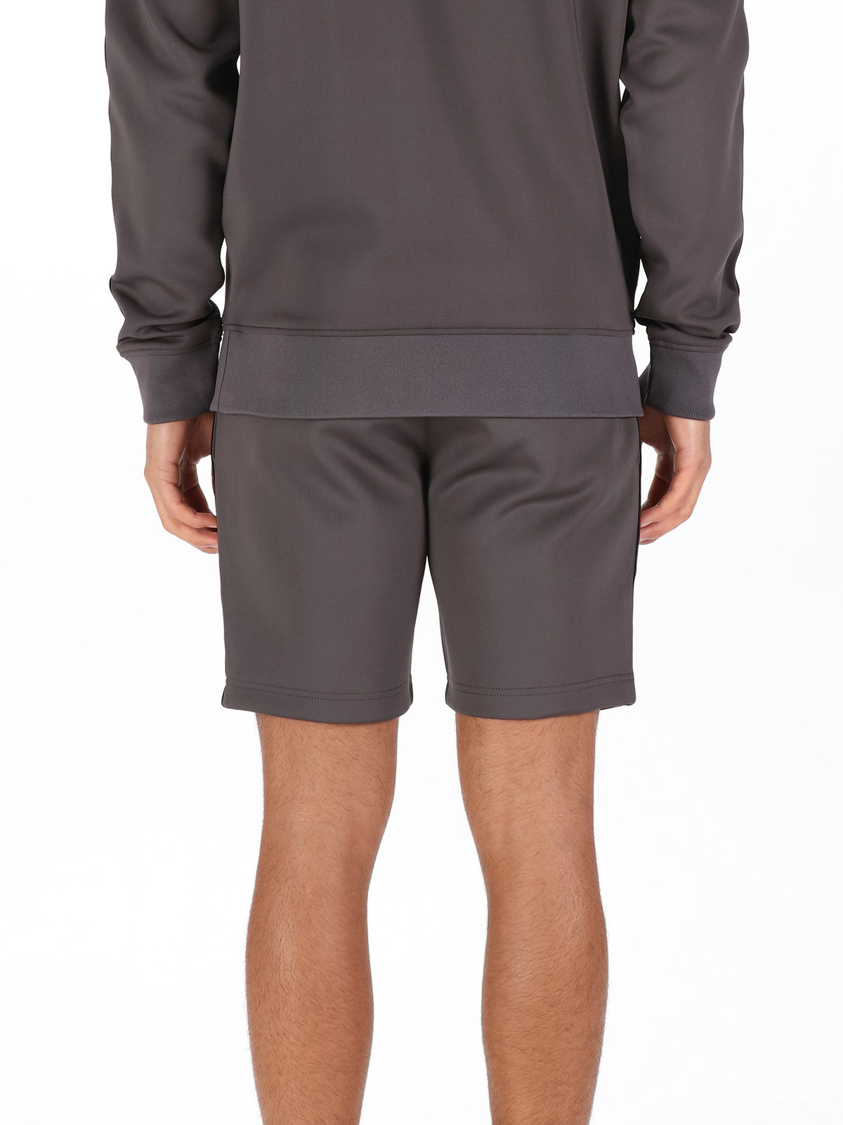 Back view of charcoal LUKE 1977 TTTST tricot shorts worn by model