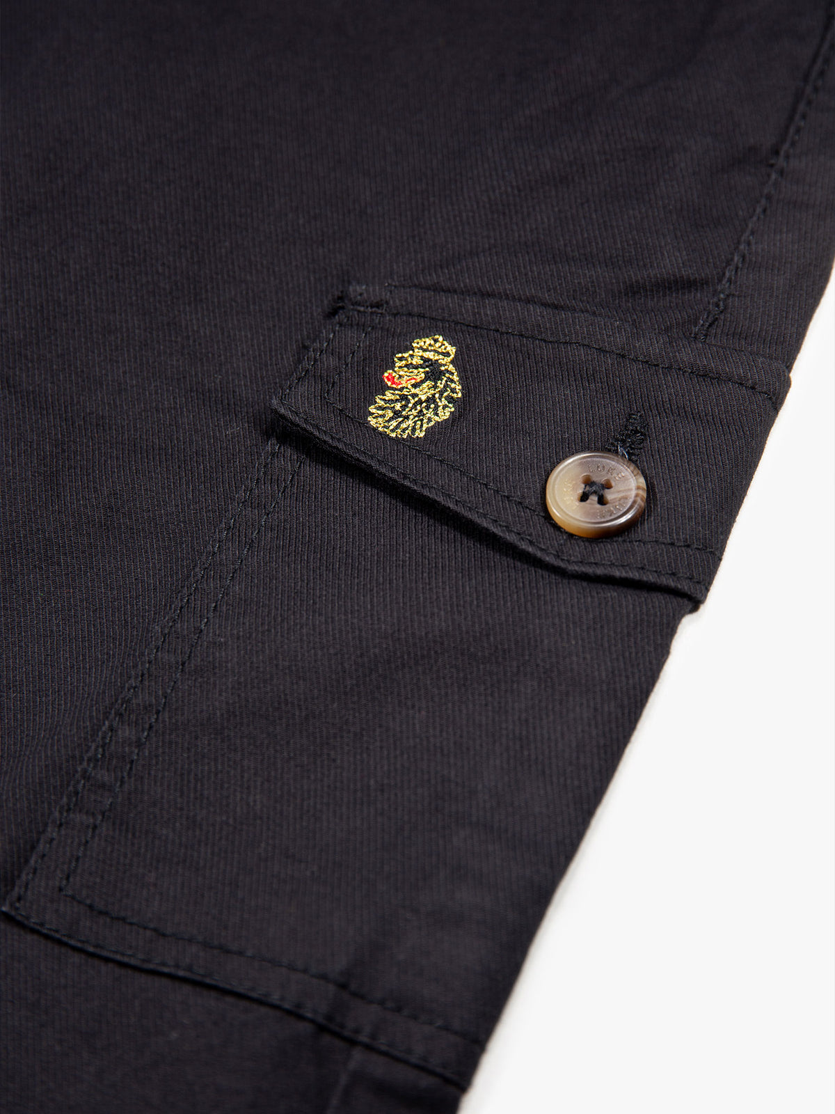 Boy's black trousers with cotton, pocket detail view