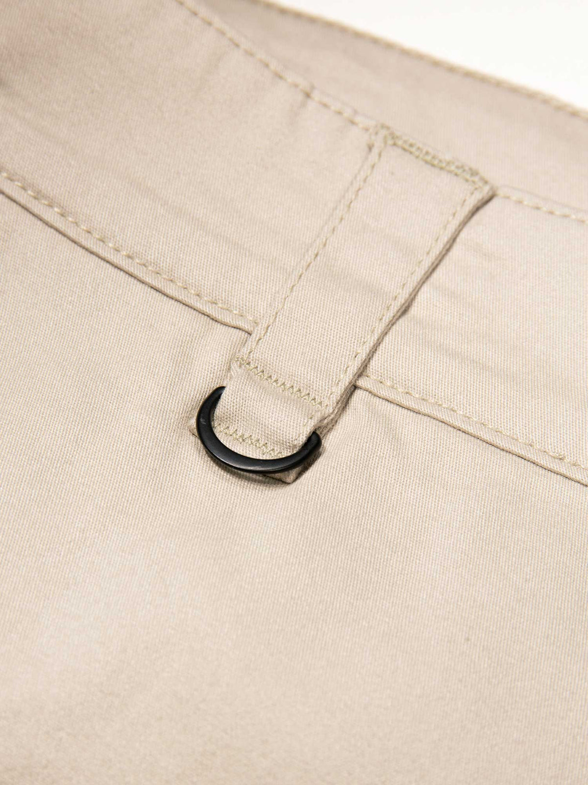 Men's beige shorts with drawstring waistband and cargo pockets, detail view 2