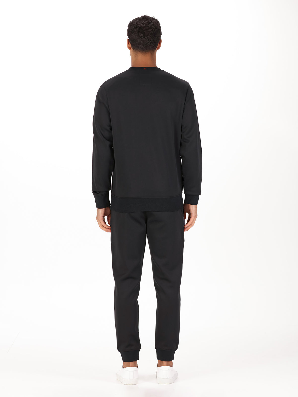 Men's black tracksuit with sweatshirt and matching joggers.