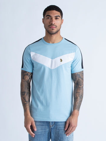 Men's blue t-shirt with crew neck and short sleeves worn by a model - front view.