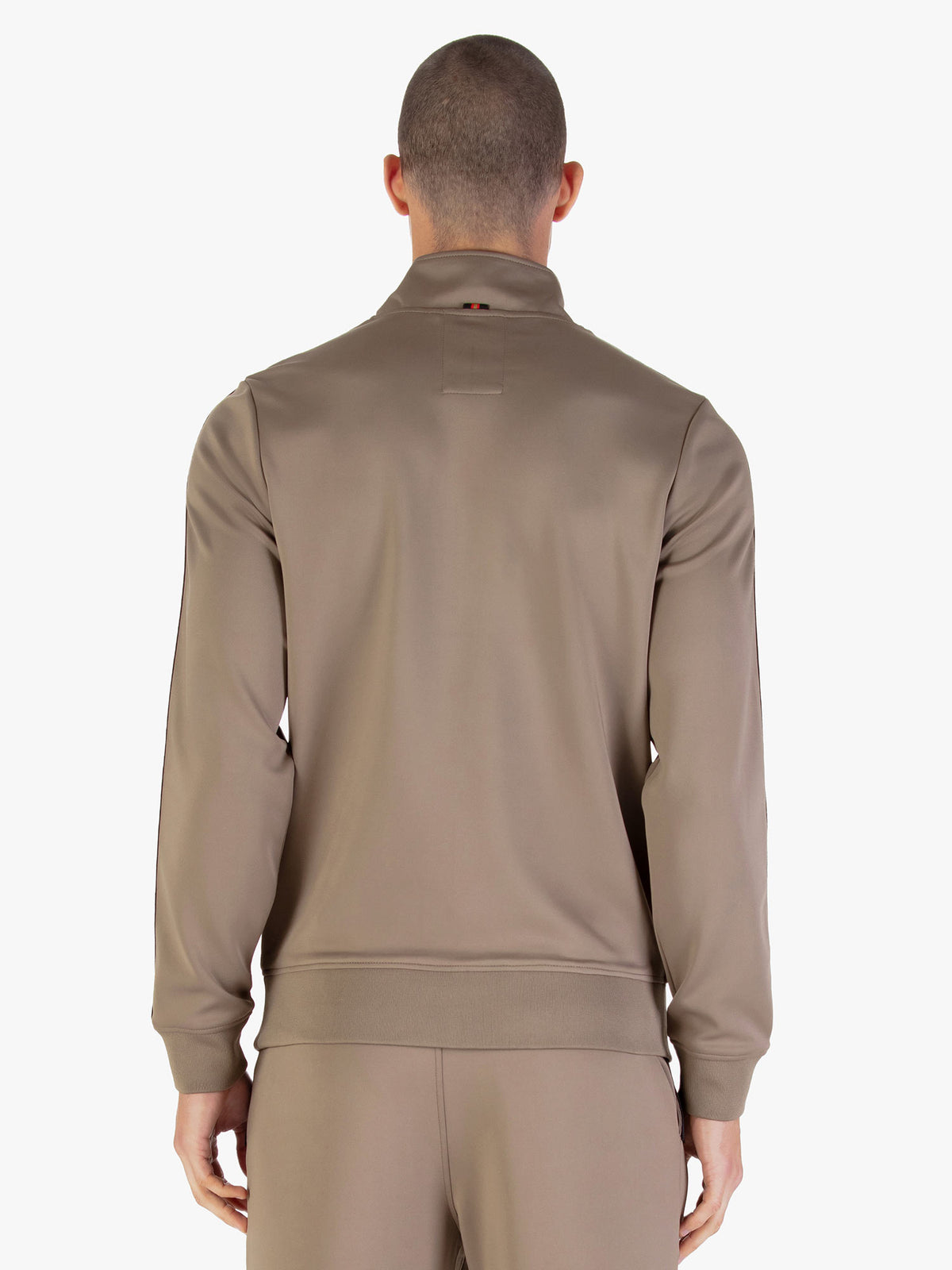 Back view of brown LUKE 1977 TTTQR quarter zip sweatshirt worn by model