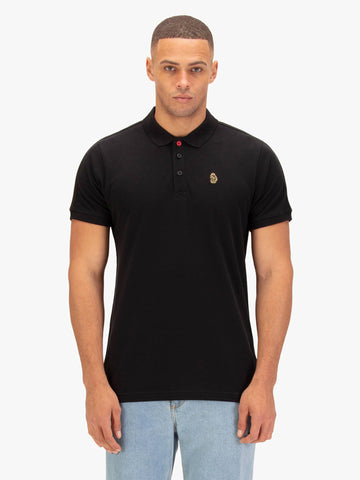 Men's black polo shirt with polo collar, worn by a model - front view
