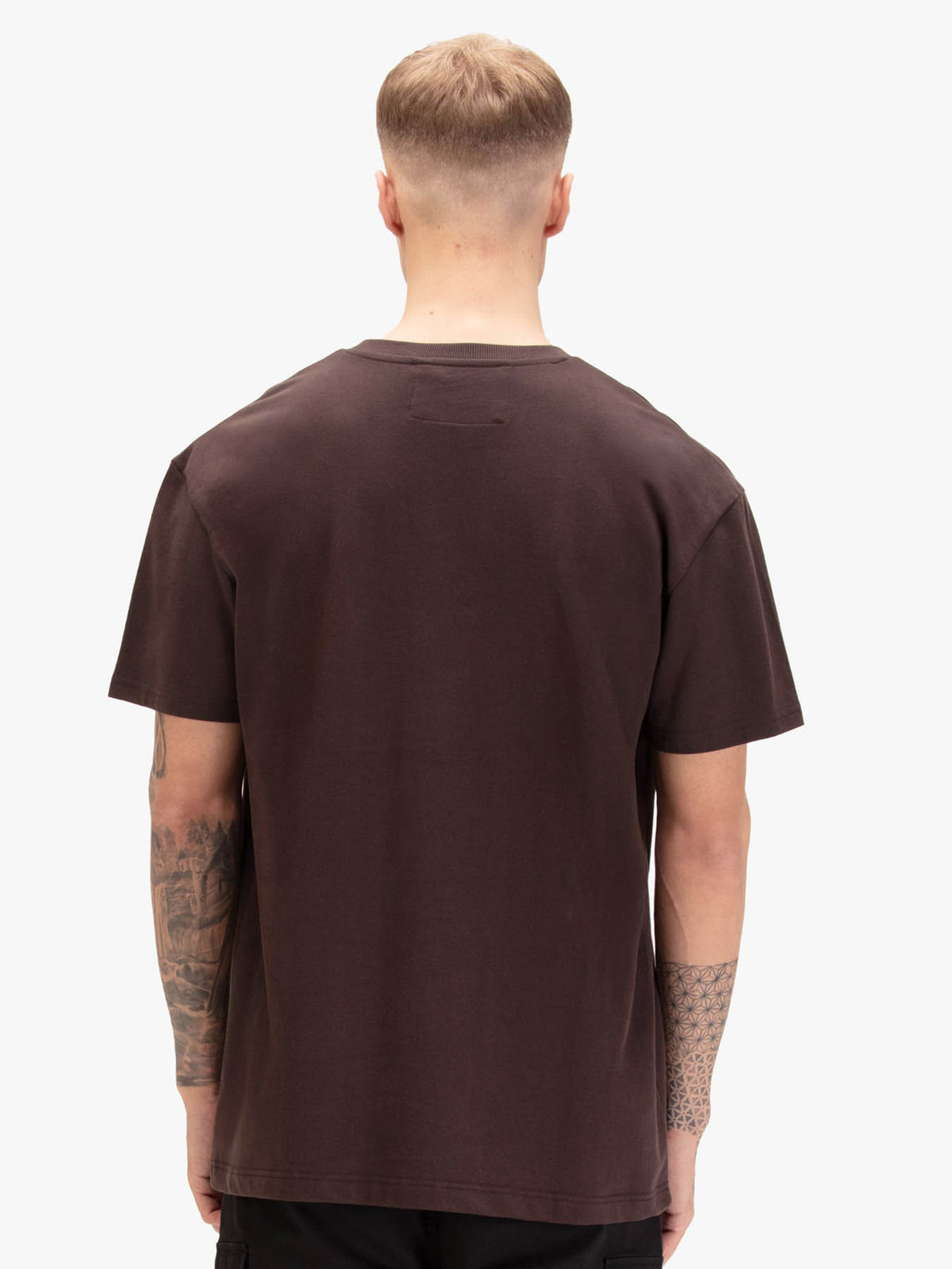 Men's relaxed-fit brown t-shirt with crew neck and short sleeves, worn by a model, back view