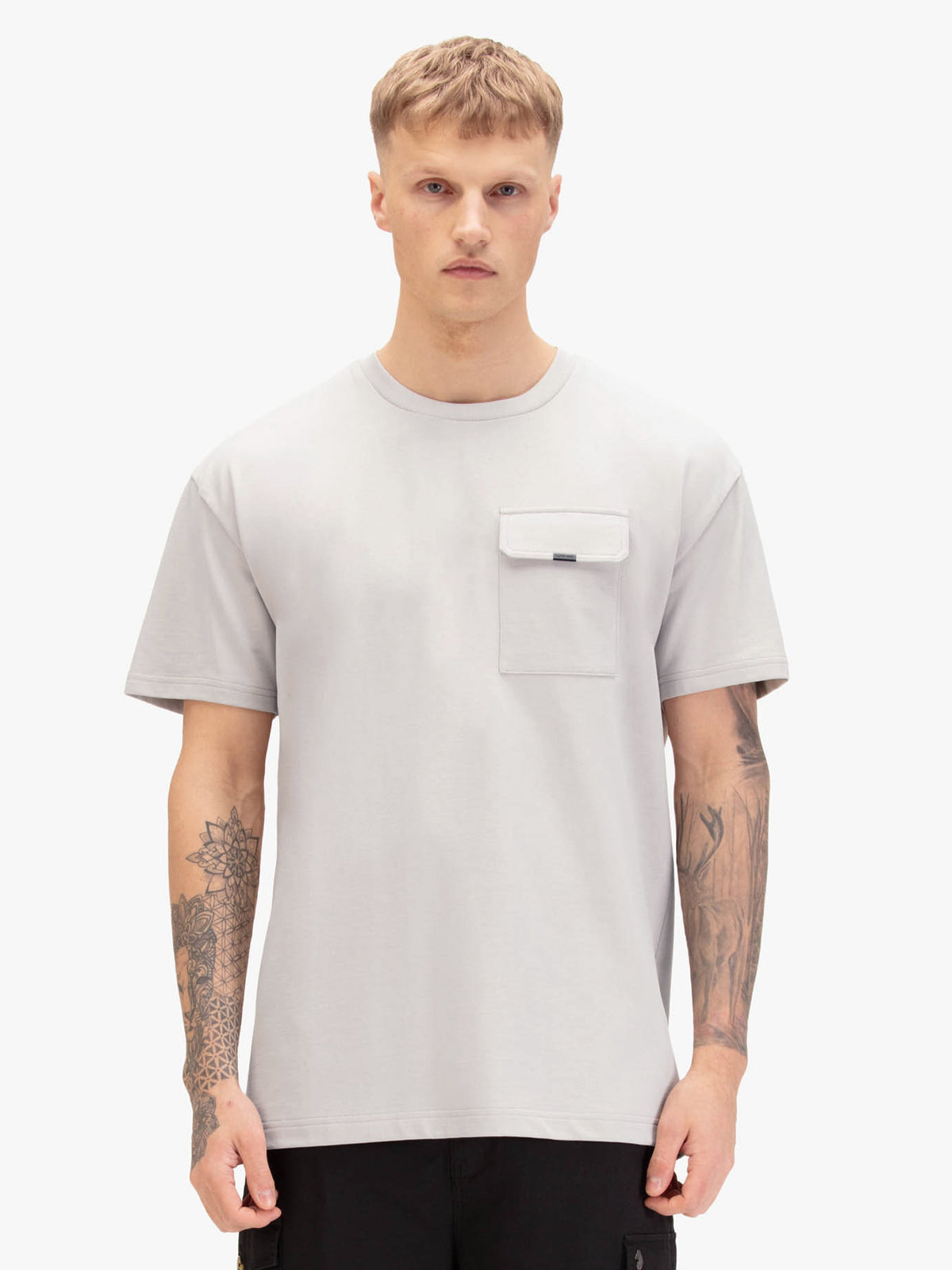 Men's relaxed-fit grey t-shirt with crew neck and short sleeves, worn by a model, front view