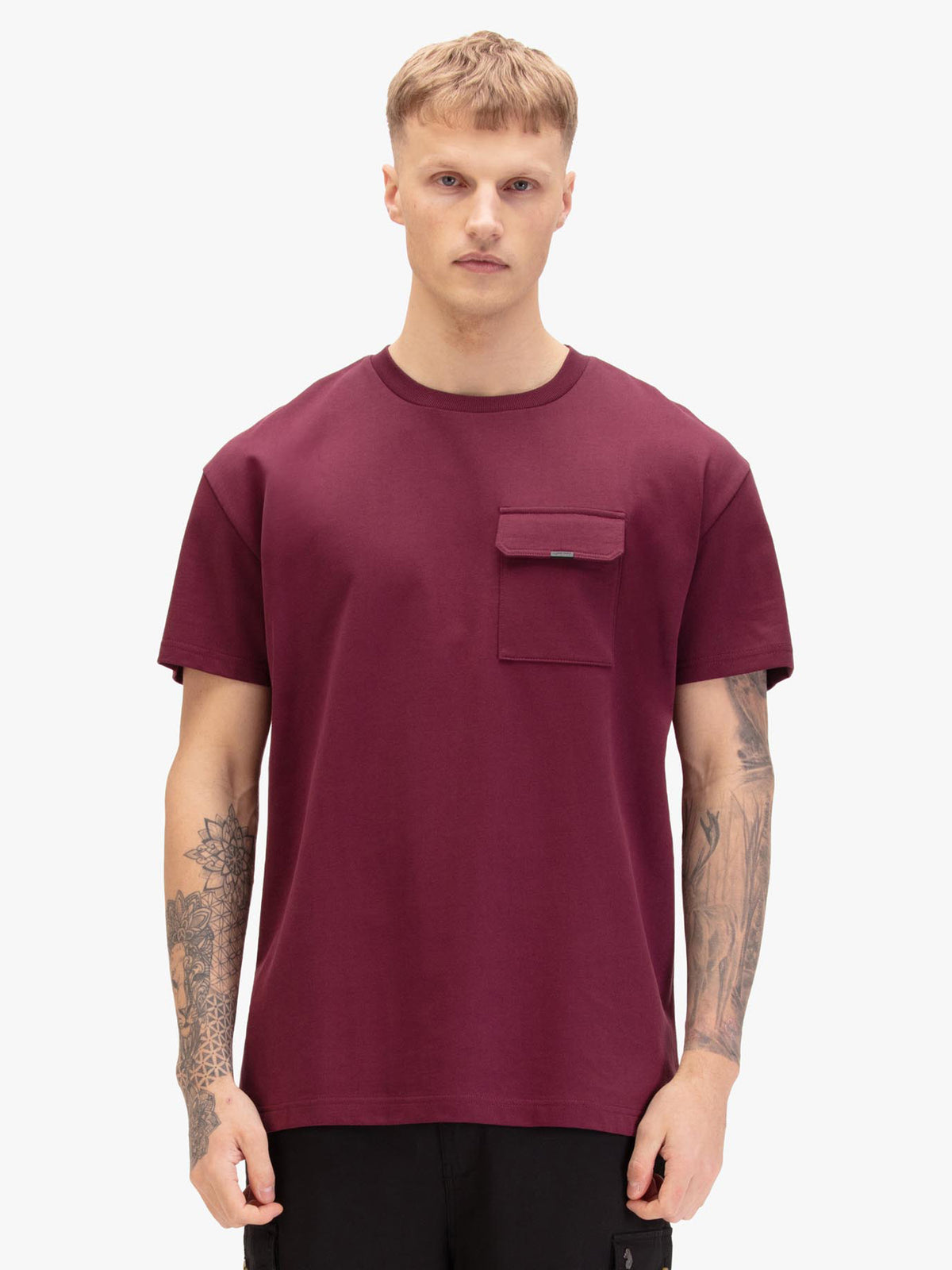 Men's relaxed-fit red t-shirt with crew neck and short sleeves, worn by a model, front view