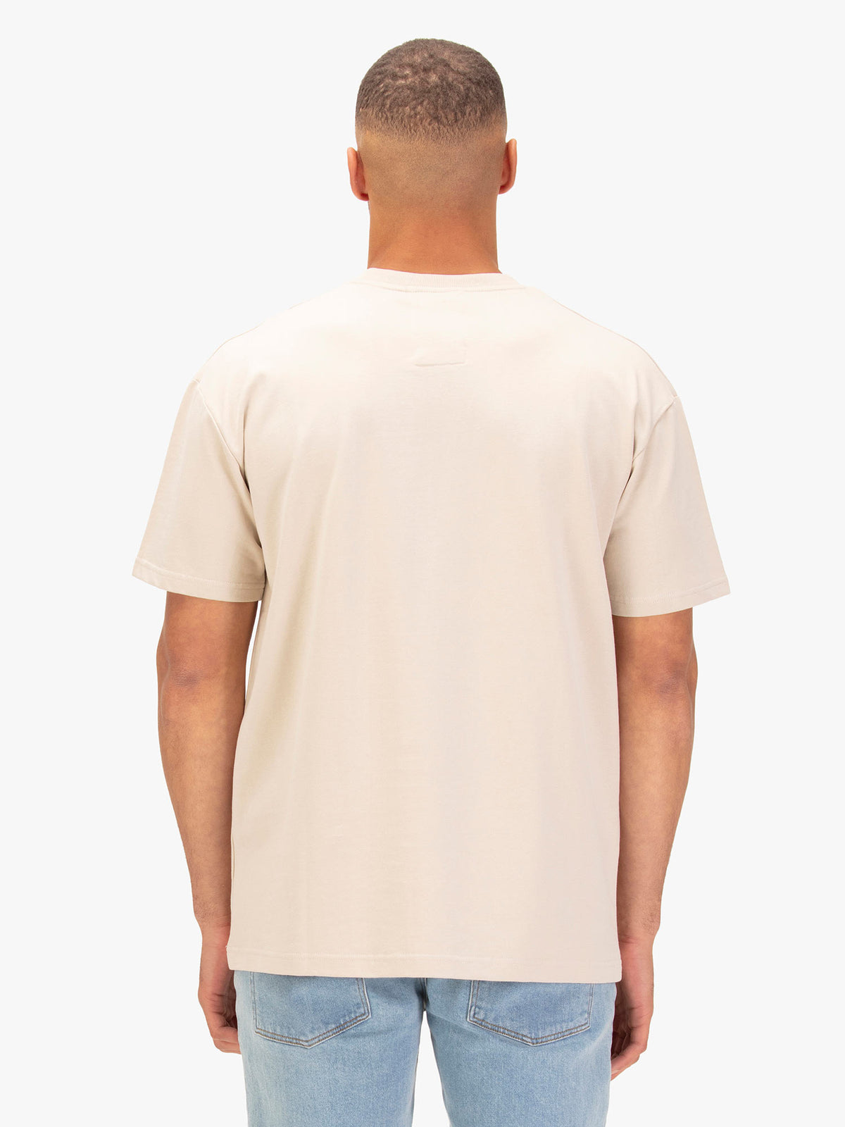 Men's relaxed-fit beige t-shirt with crew neck and short sleeves.