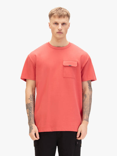 Men's relaxed-fit red t-shirt with crew neck and short sleeves, worn by a model, front view