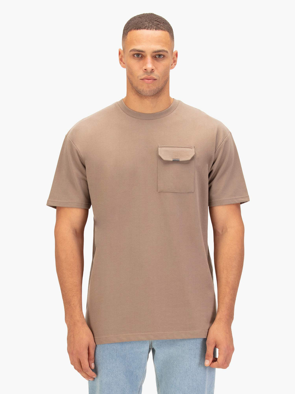 Man wearing Hard Nut brown LUKE 1977 Dragger chest pocket t-shirt, front view