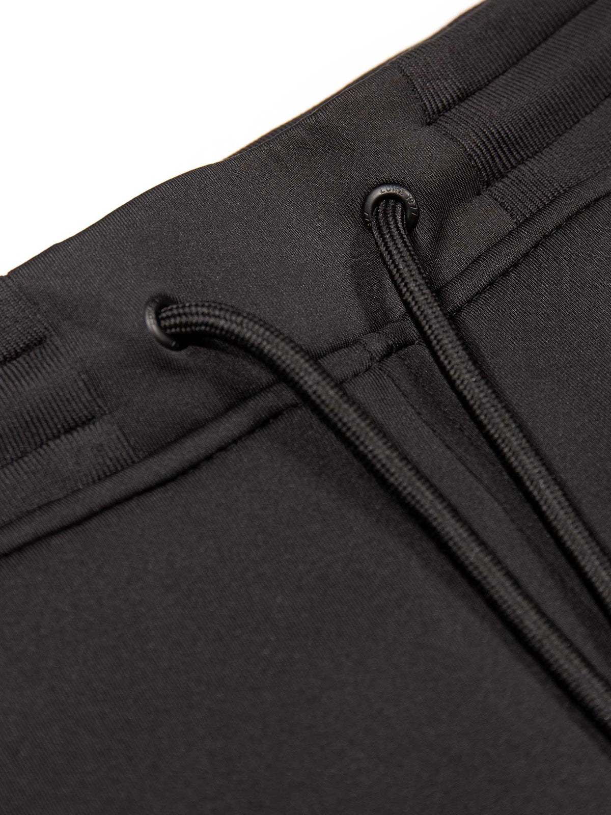 Men's black shorts with drawstring waistband, detail view 1