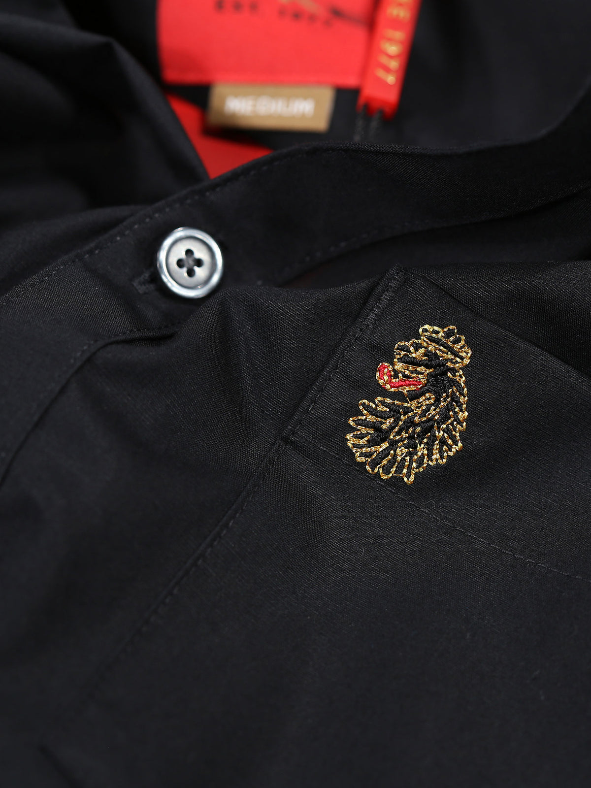 Men's black shirt with button-up front.
