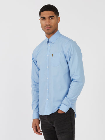Men's blue shirt with button-up front.