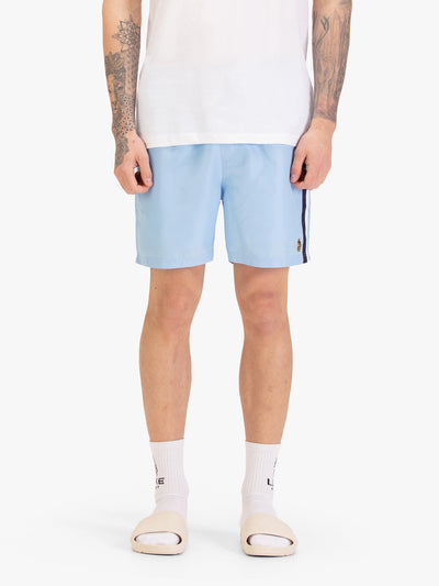 Men's blue-1 swim shorts with drawstring waistband, worn by a model, front view