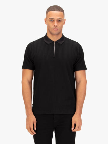 Men's black polo shirt with polo collar.