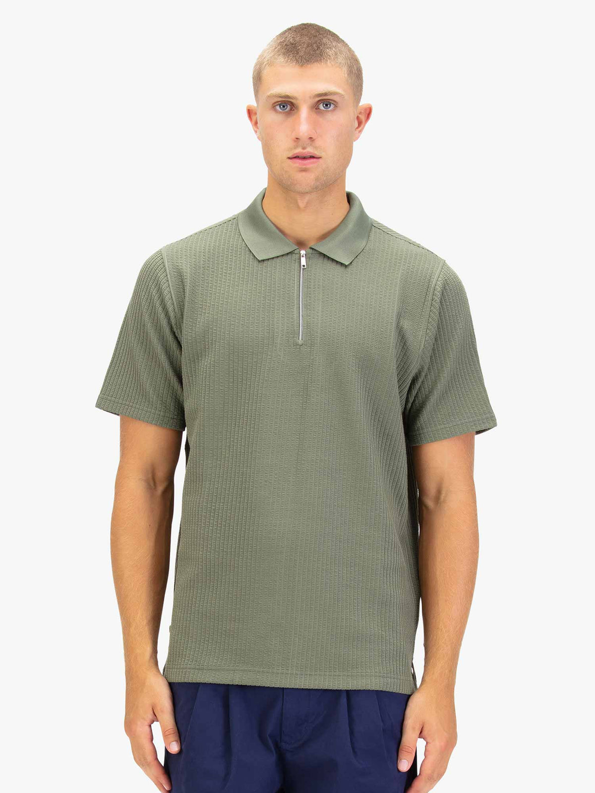 Men's green polo shirt with polo collar.
