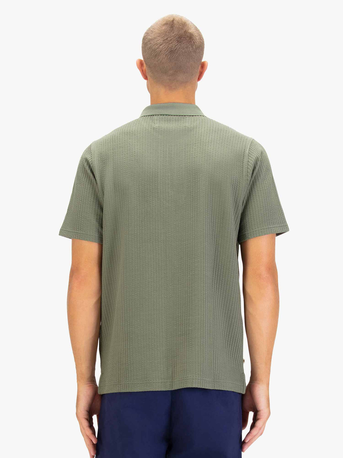 Men's green polo shirt with polo collar.