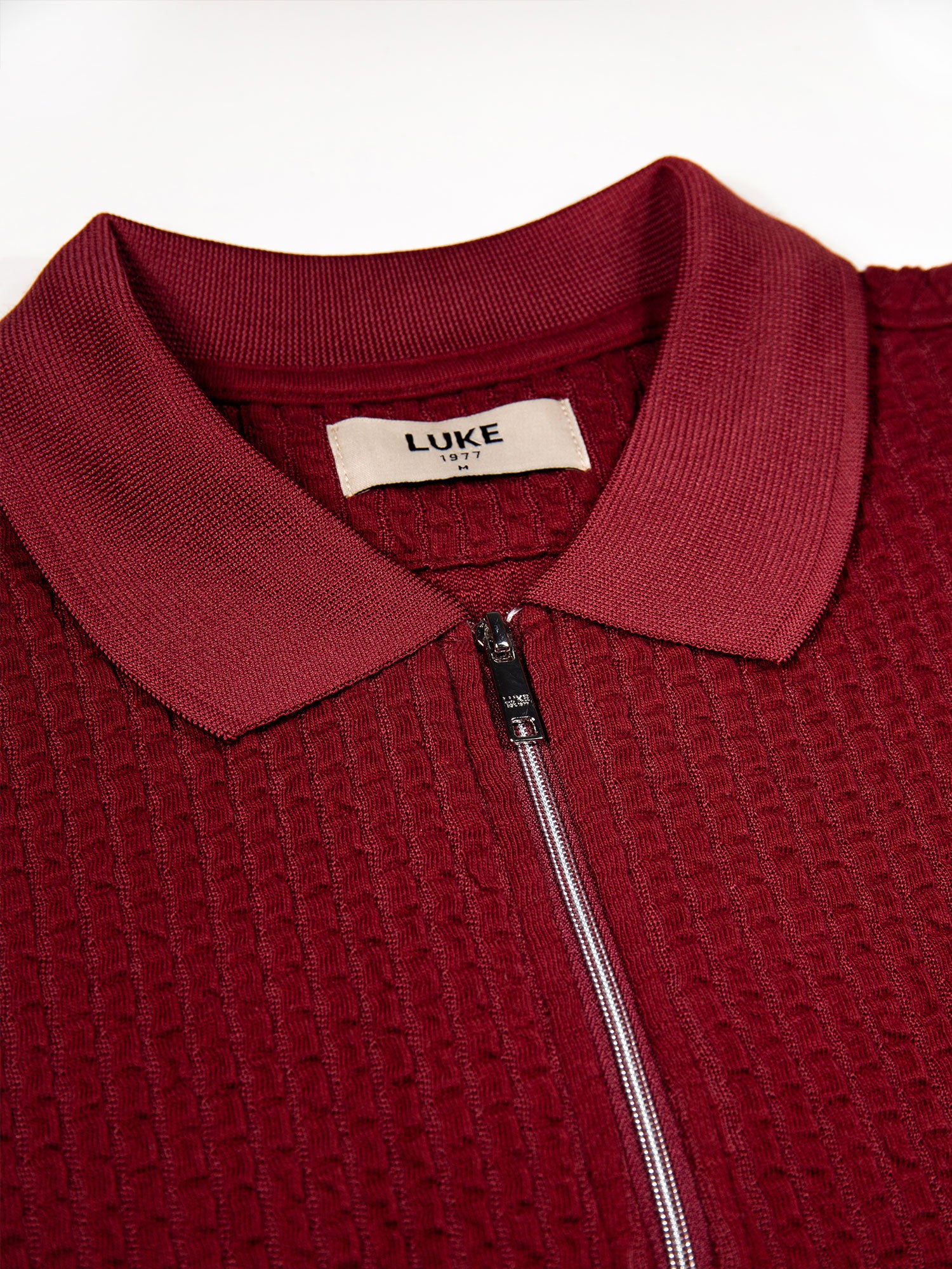 WAFFLE ON JACQUARD TEXTURED ZIP POLO