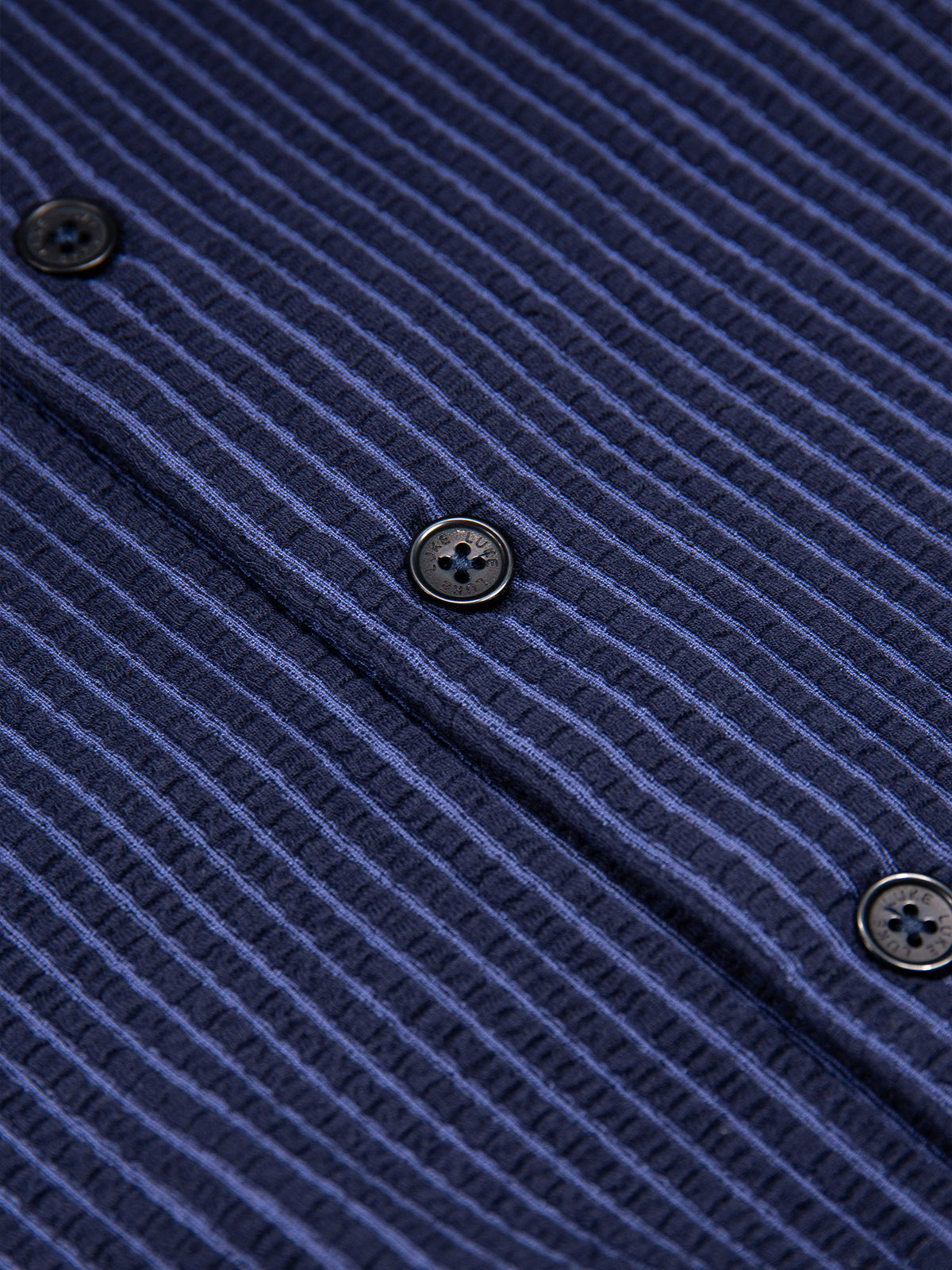 Men's navy polo shirt with polo collar.