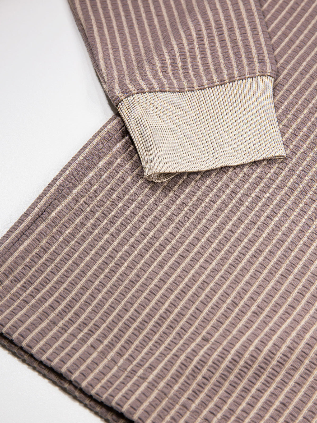 Men's brown polo shirt with polo collar.