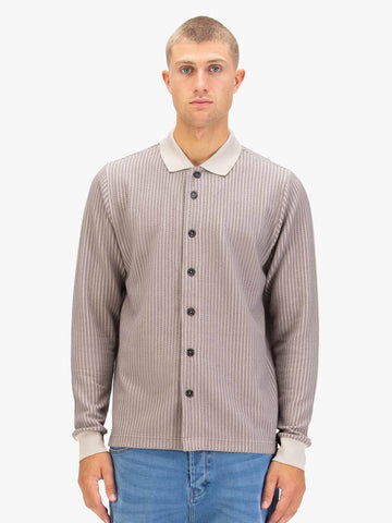 Men's brown polo shirt with polo collar.