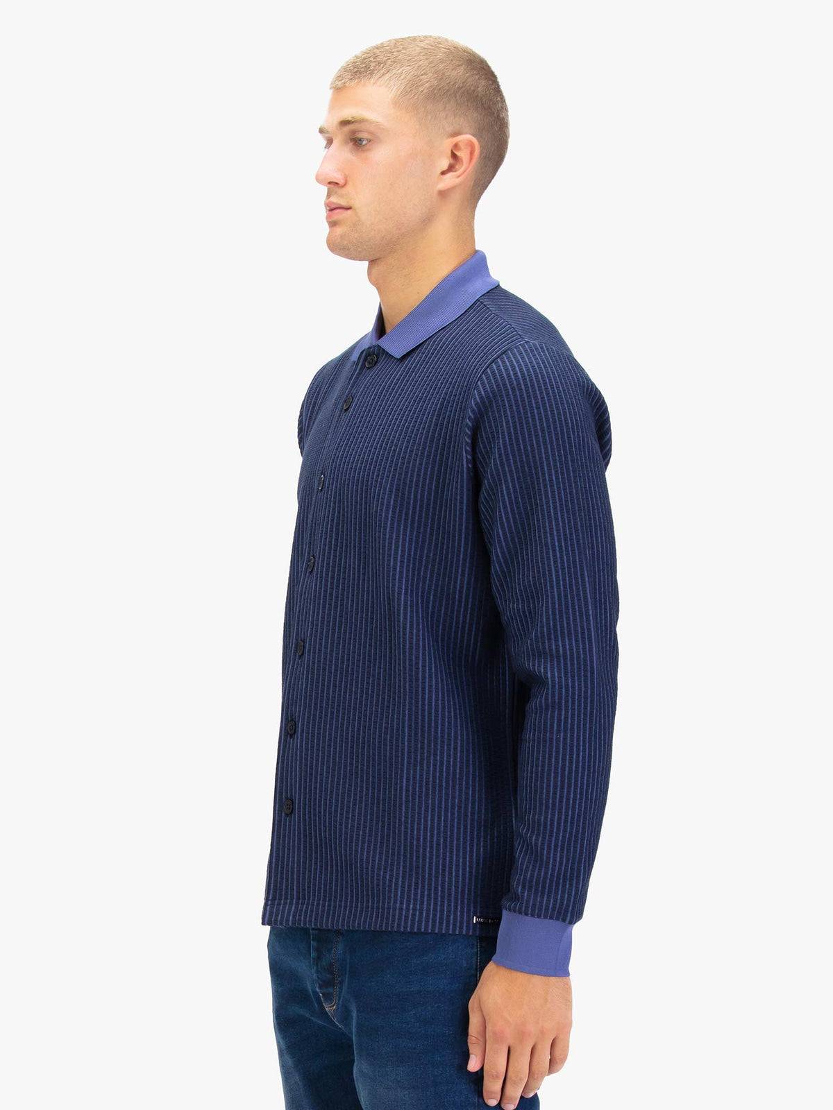 Men's navy polo shirt with polo collar.