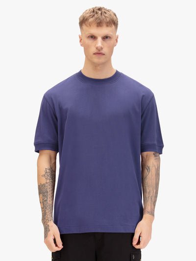 WHO WEARS THE T-SHIRT