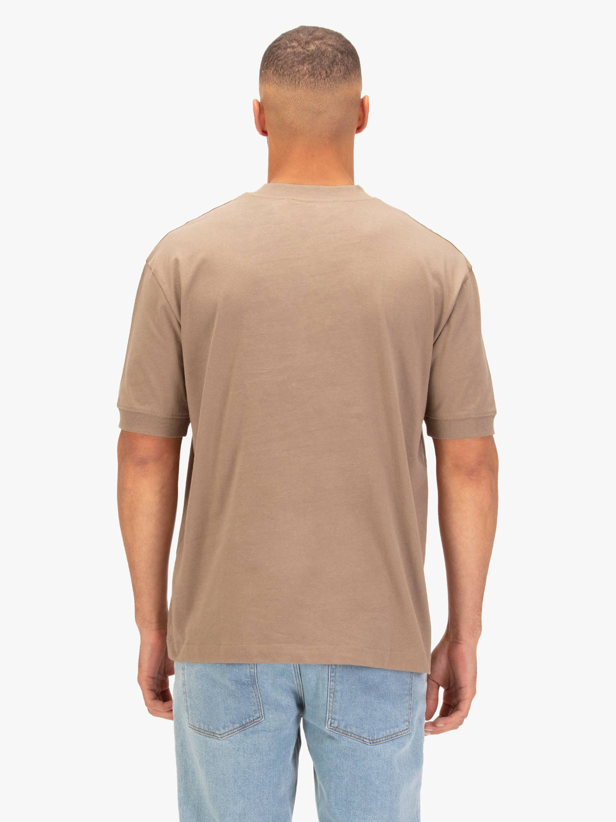 Men's relaxed-fit brown t-shirt with crew neck and short sleeves, worn by a model, back view