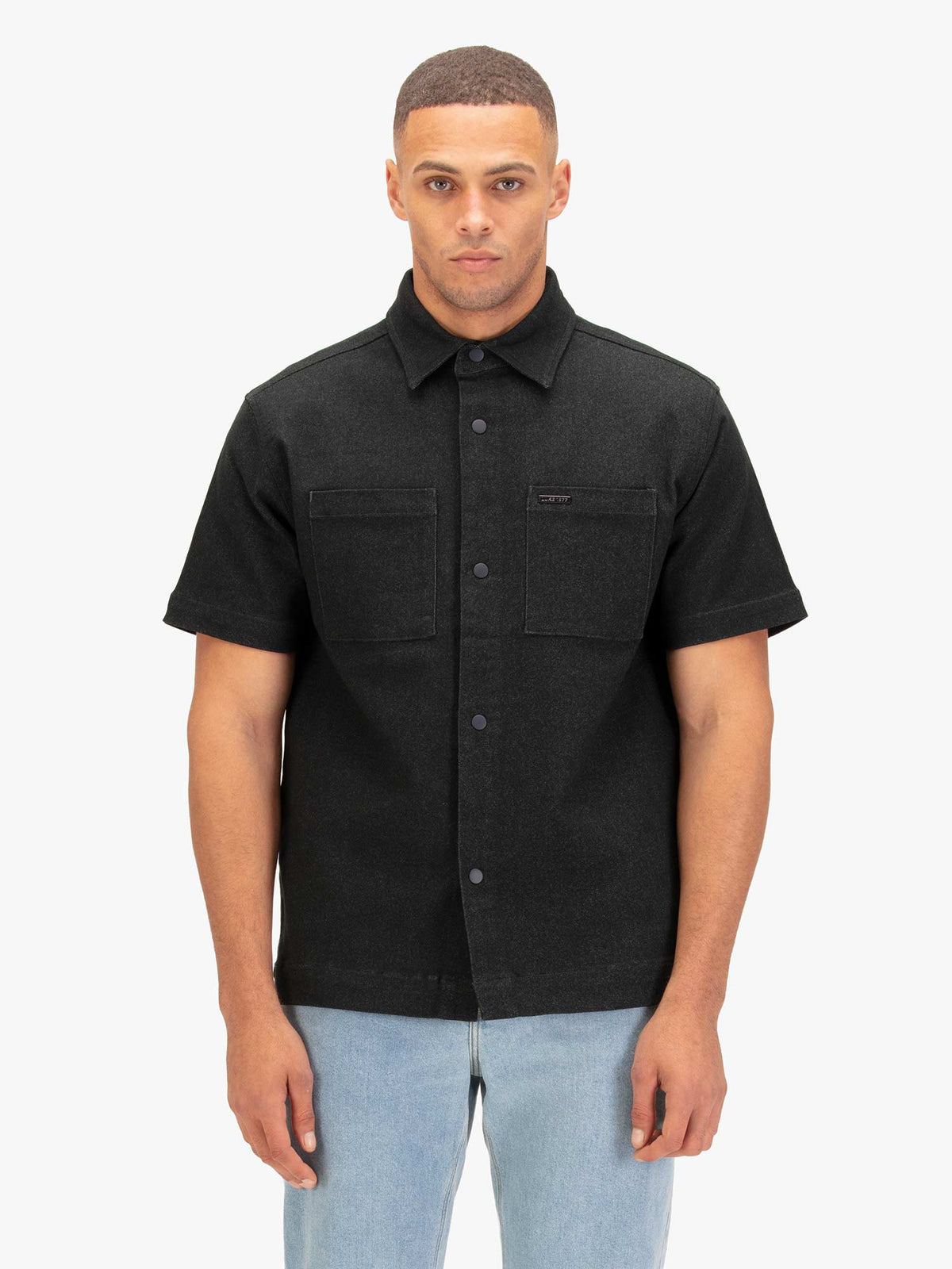 Men's grey shirt with button-up front.