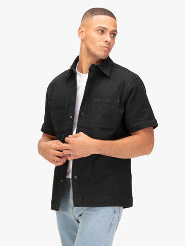 Men's grey shirt with button-up front.