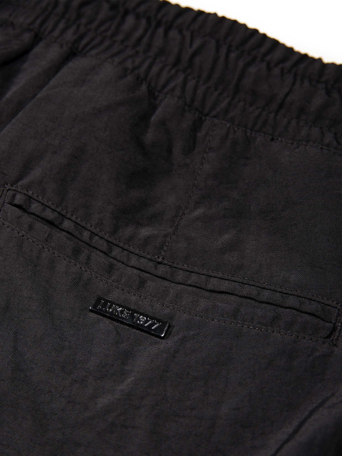 Men's black shorts with elasticated waistband, detail view 3
