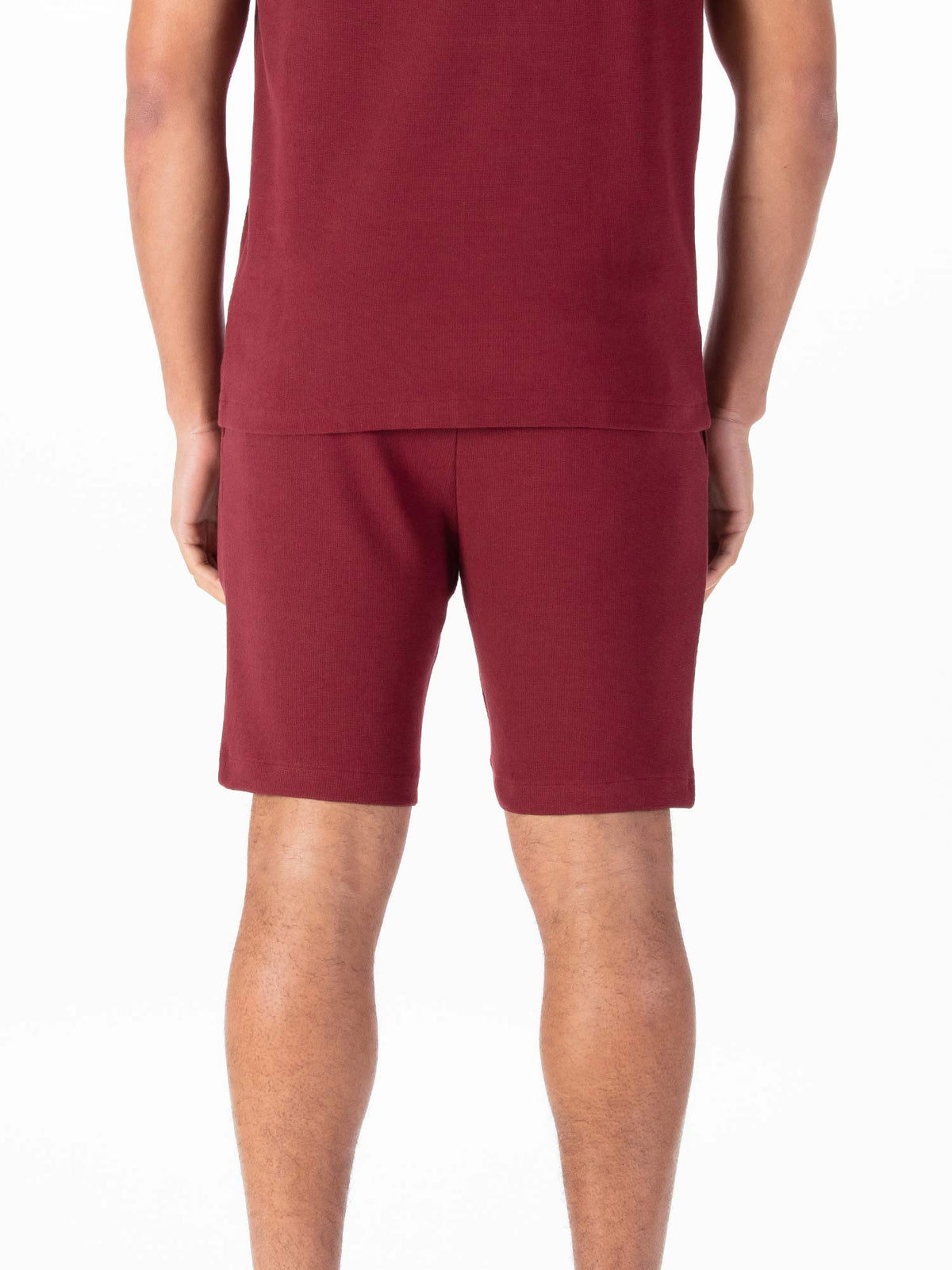 Men's red shorts with drawstring waistband.