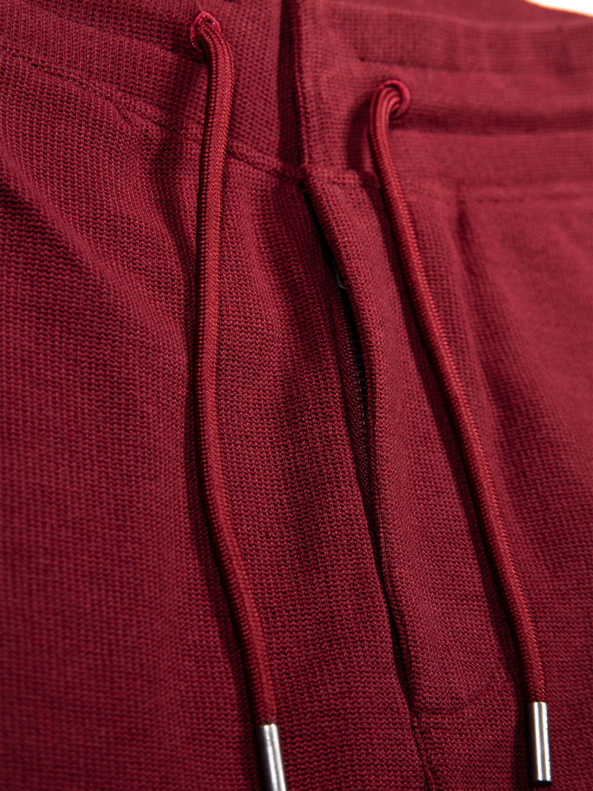 Men's red shorts with drawstring waistband.