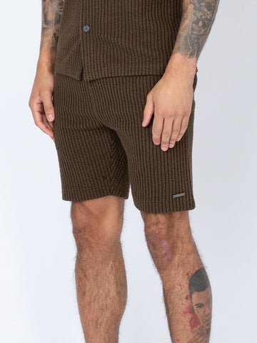 Men's brown shorts with drawstring waistband.