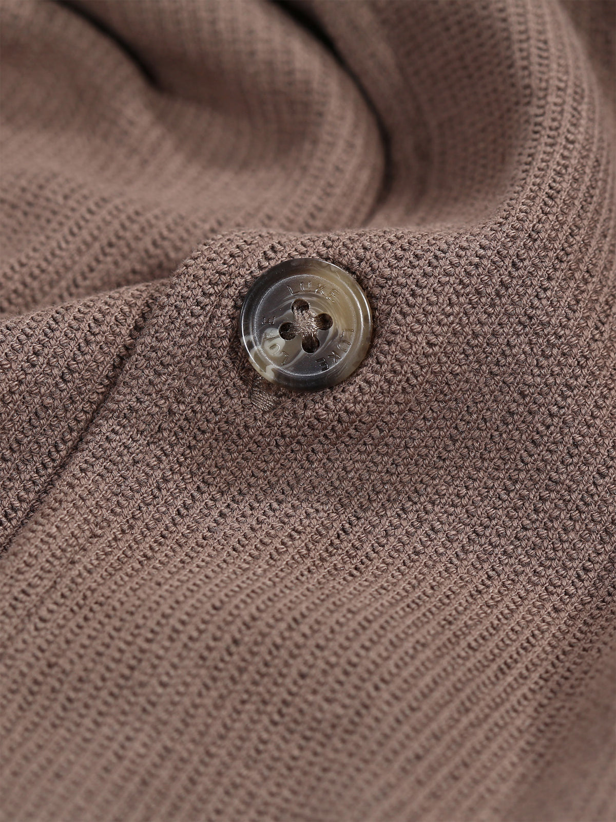 Men's brown shirt with button-up front.