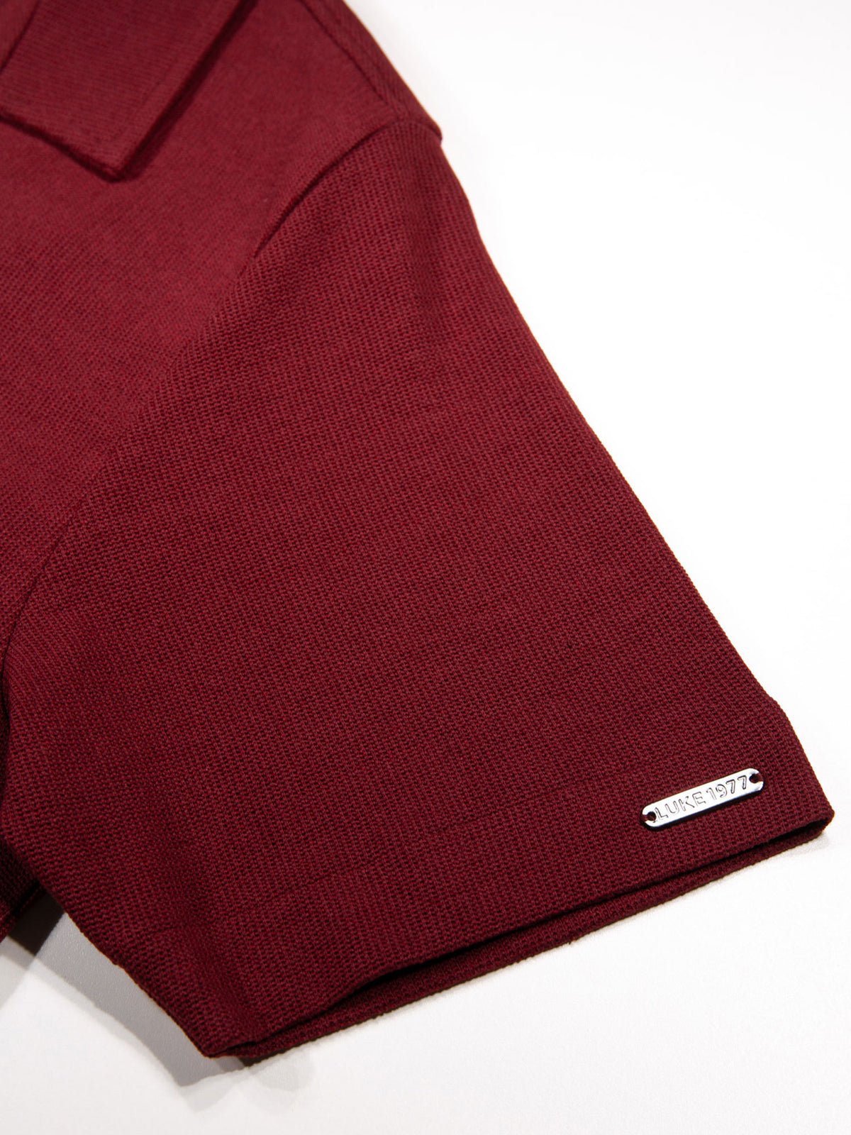 Men's red shirt with button-up front.