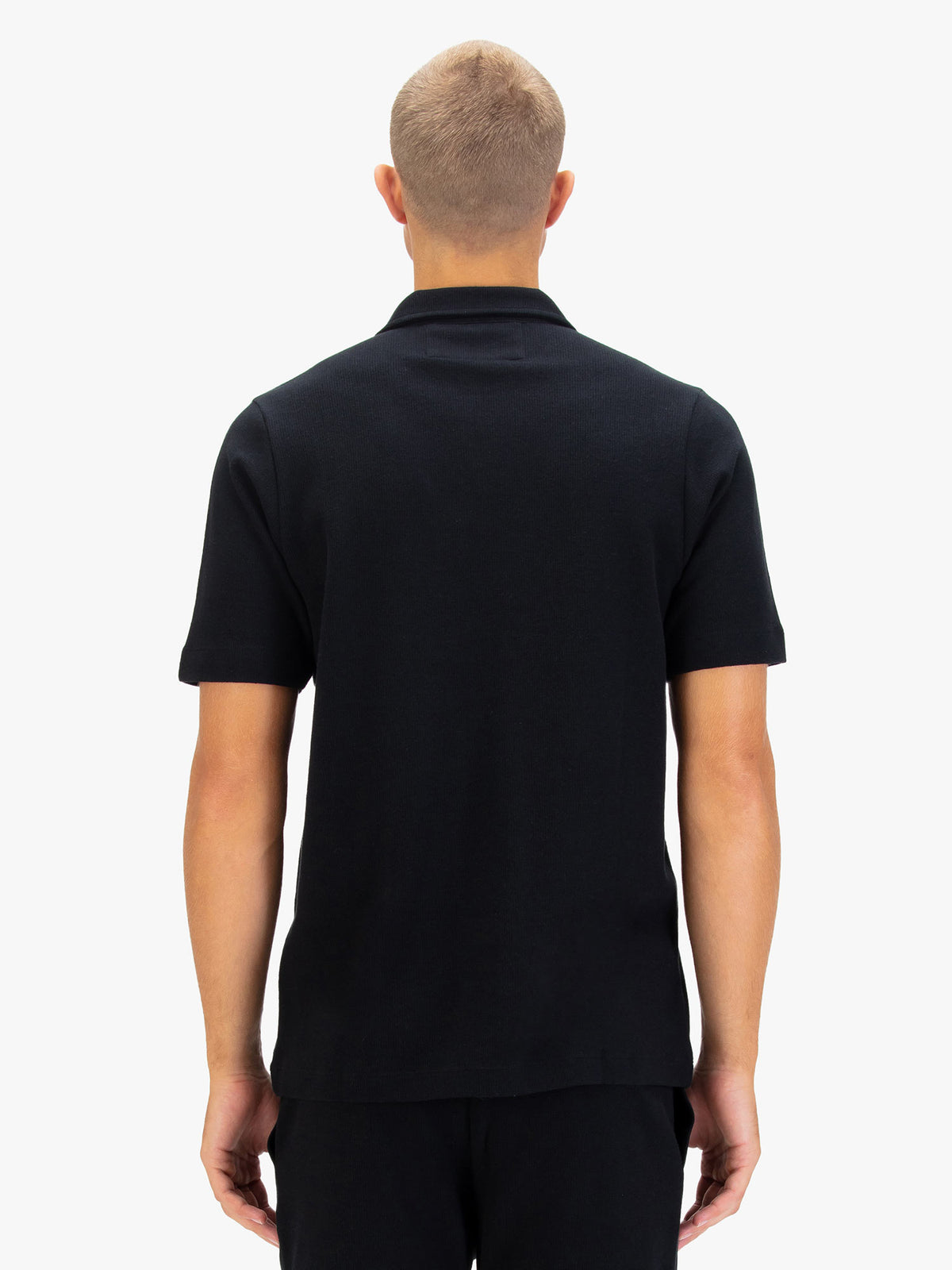 Men's black polo shirt with polo collar.