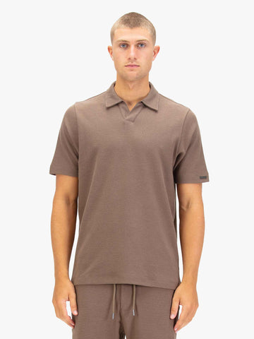 Men's brown polo shirt with polo collar.
