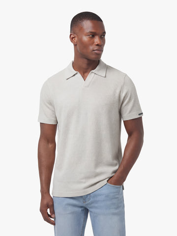 Men's grey polo shirt with polo collar, back view