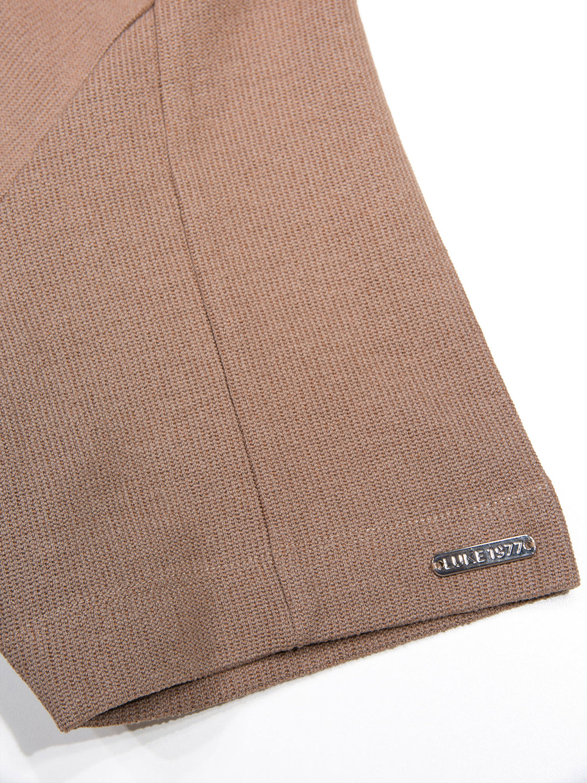 Men's brown polo shirt with polo collar.