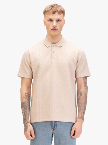 Men's beige polo shirt with polo collar, worn by a model, front view