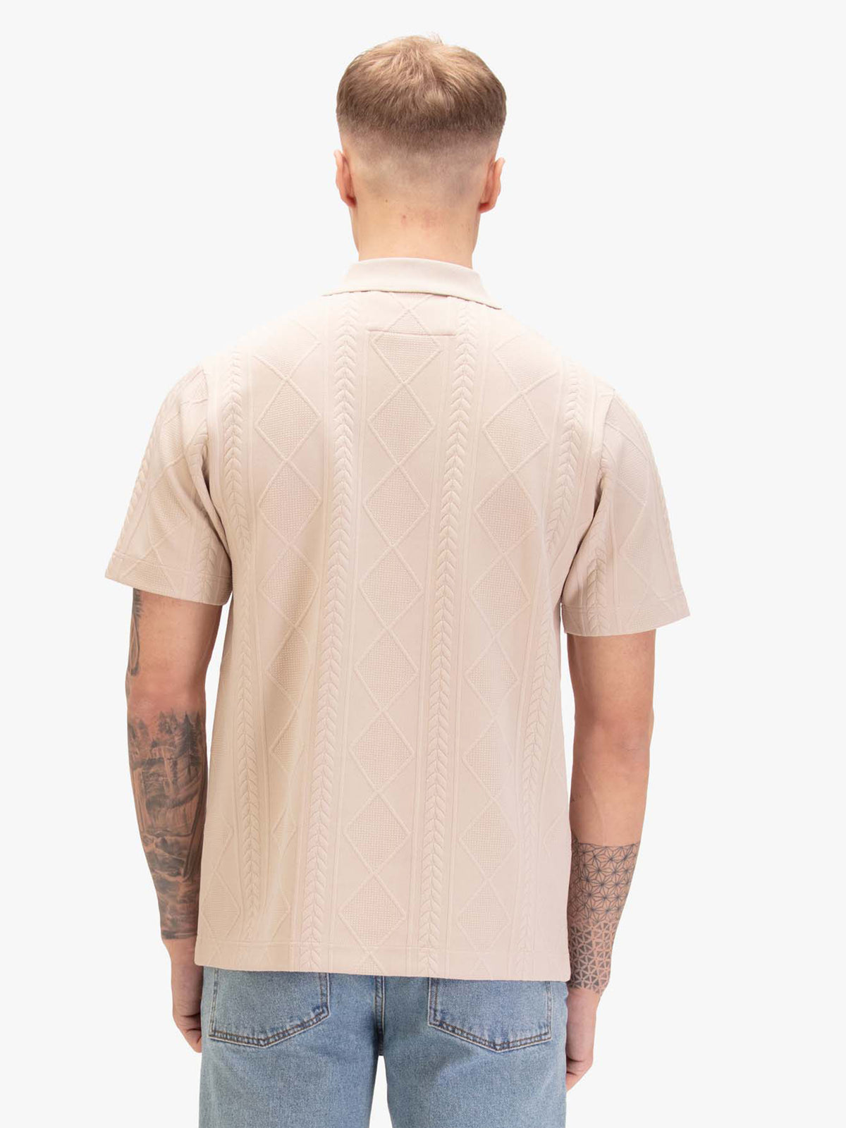 Men's beige polo shirt with polo collar, worn by a model, back view