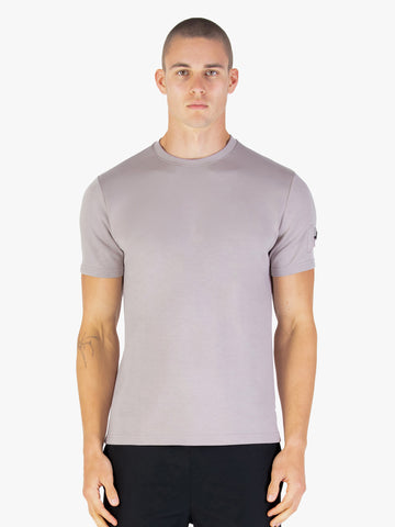 Men's grey t-shirt with crew neck and short sleeves worn by a model - front view.