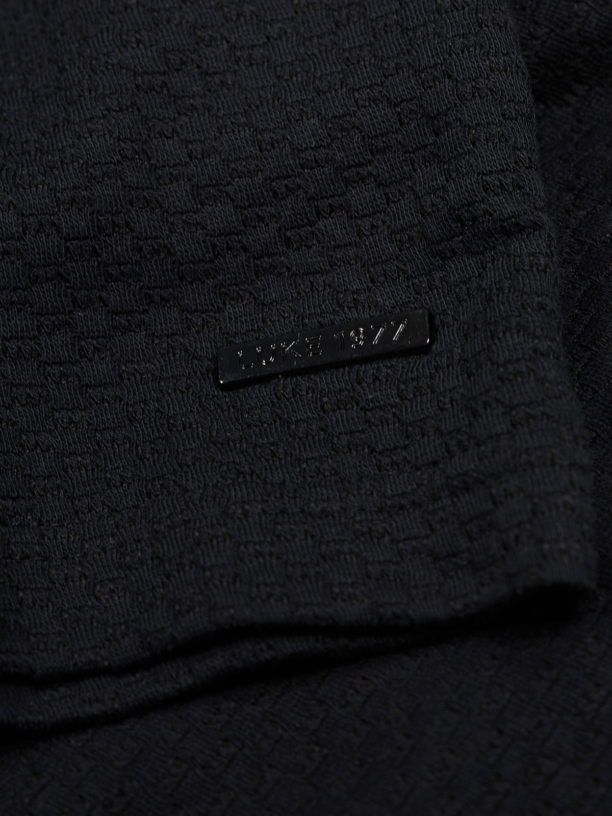 Men's black t-shirt with crew neck and short sleeves.