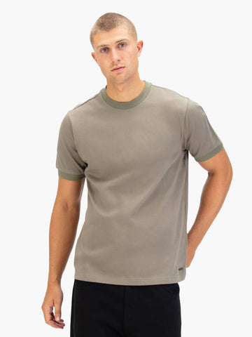 Men's brown t-shirt with crew neck and short sleeves worn by a model - front view.