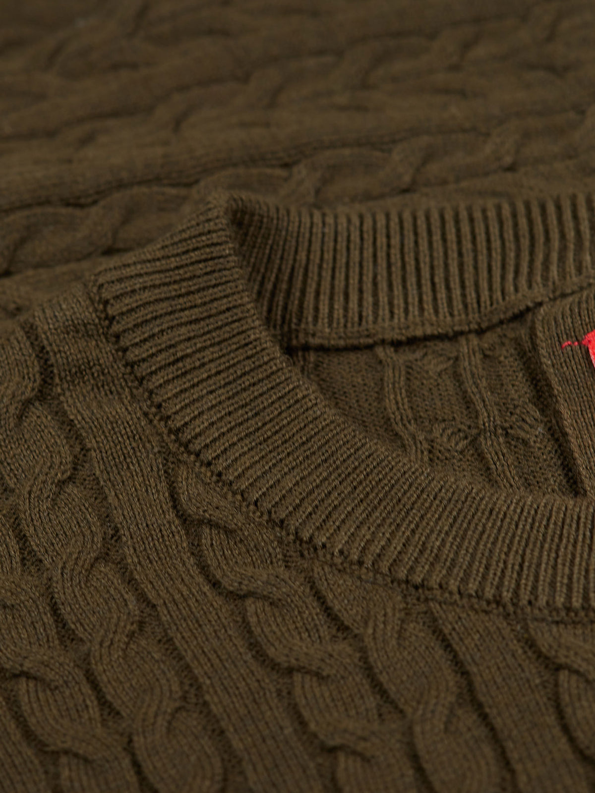 Men's green jumper.