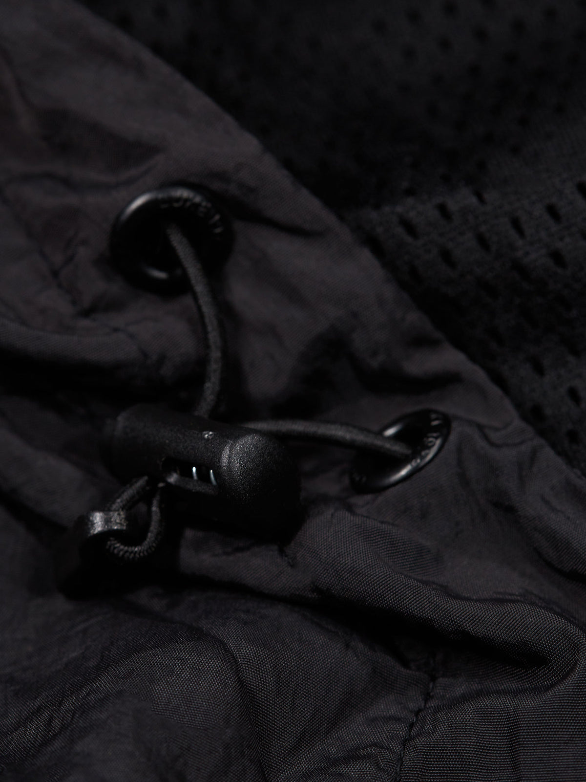 Men's black jacket with front pocket.