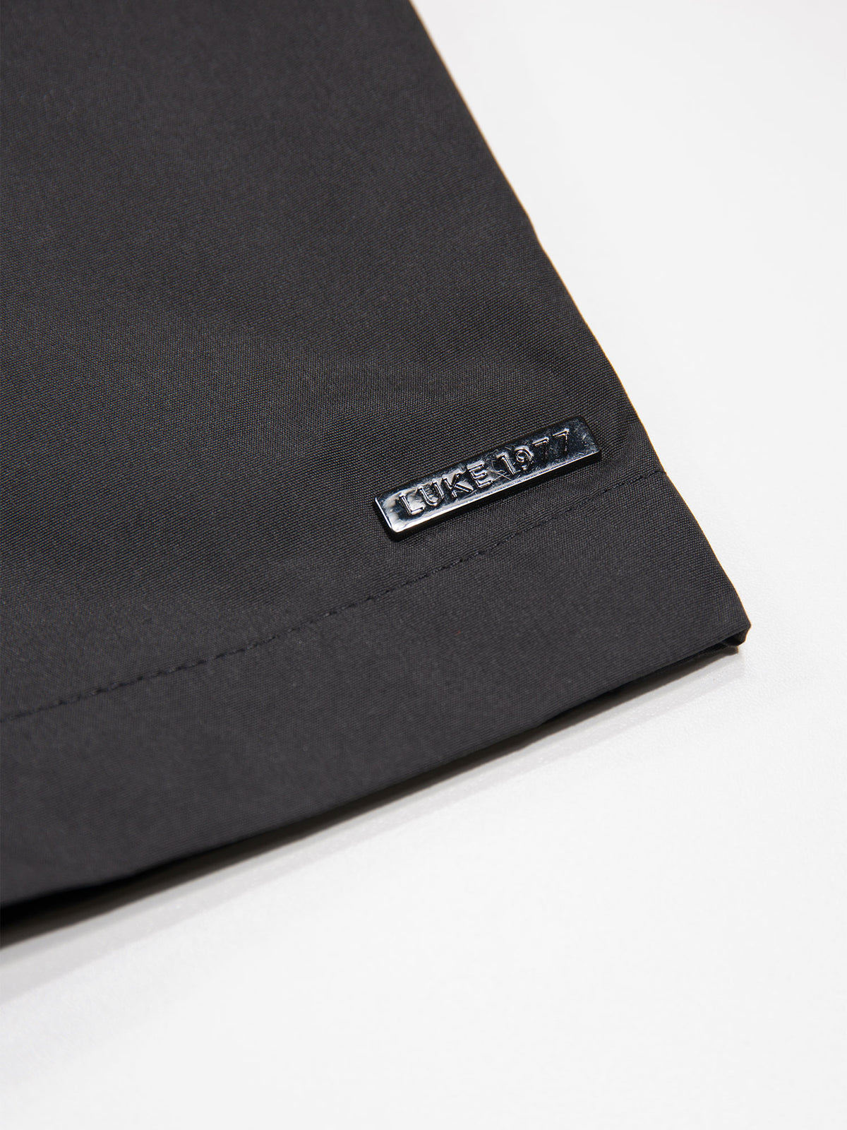 Men's black coat.